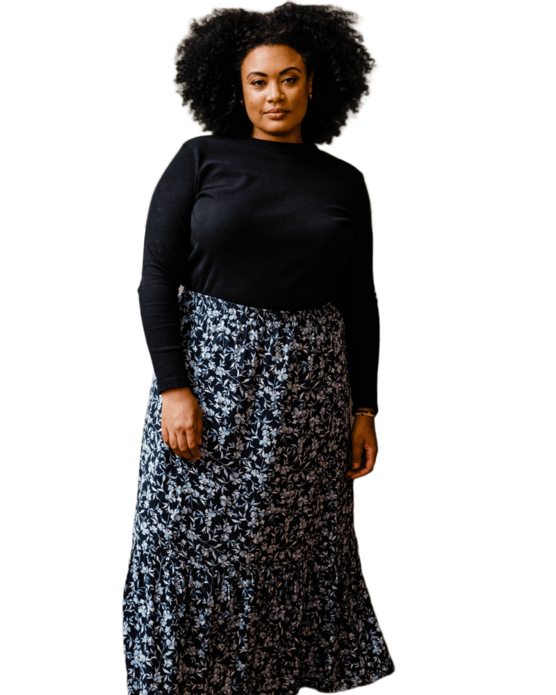 Front of a model wearing a size 3X Catherine Maxi Flounce Skirt in Blue & Black by ABLE. | dia_product_style_image_id:316047